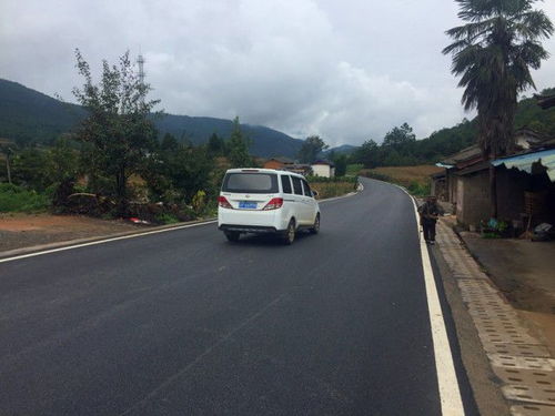 214國道麗江段改建工程基本完工 全線二級路面 設(shè)計時速60公里